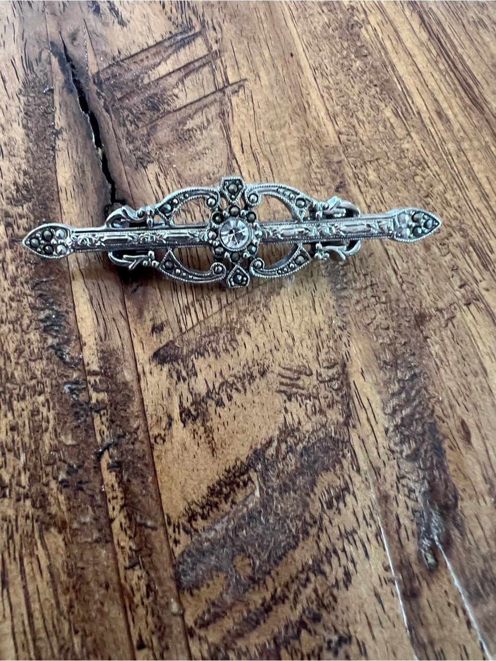 Vintage Silver-Tone Filigree Brooch with Clear Stone